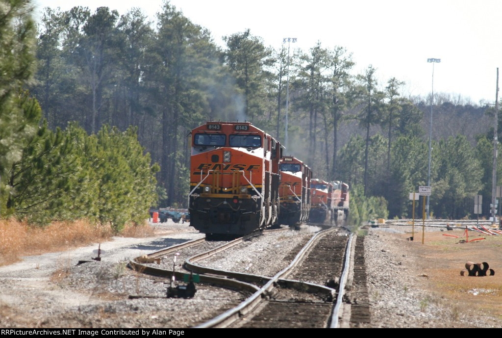 BNSF 8143 rests in a trio of units